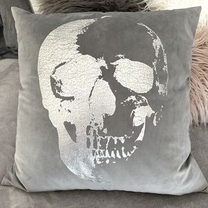 Excellent condition Dormify grey velvet throw pillow with silver skull detail.